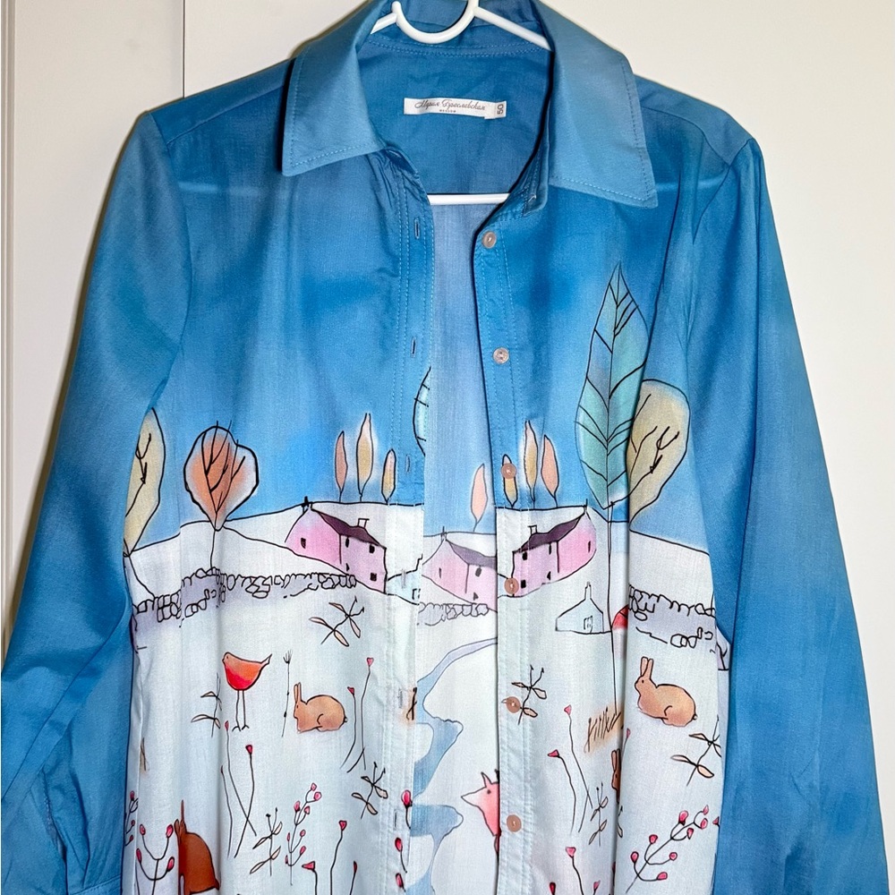 Ariya Blue Off-the-Shoulder Sweater with Artistic Design